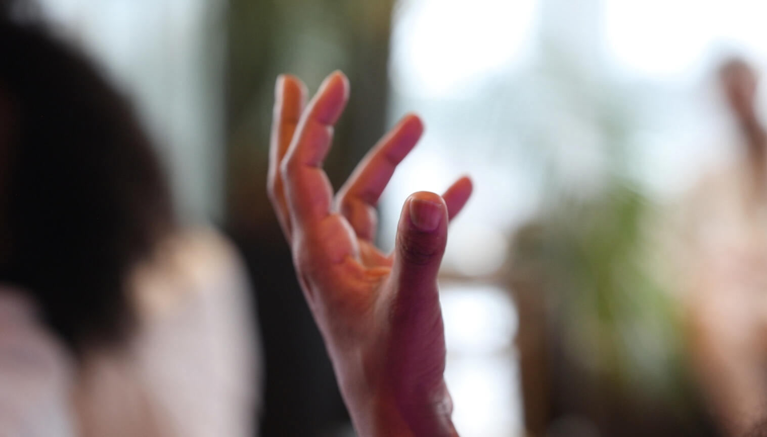 Hand streched into the air